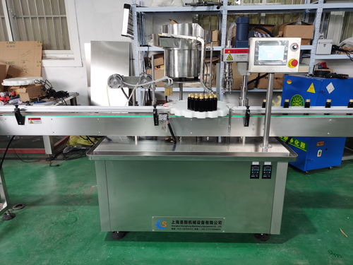 口服液灌装轧盖机工作原理